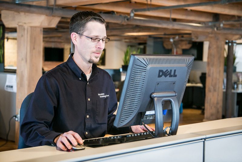 Macatawa Technologies IT professional working on IT support